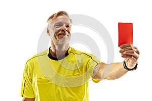 Football referee showing a red card to a displeased player isolated on white background