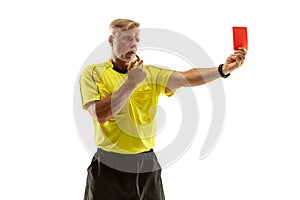 Football referee showing a red card to a displeased player isolated on white background