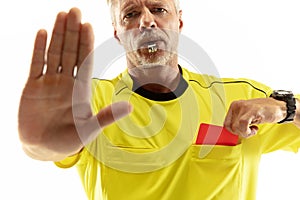 Football referee showing a red card to a displeased player isolated on white background