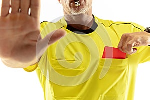 Football referee showing a red card to a displeased player isolated on white background