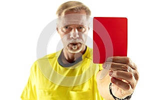 Football referee showing a red card to a displeased player isolated on white background