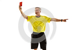 Football referee showing a red card to a displeased player isolated on white background