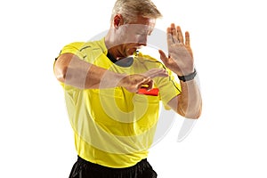 Football referee showing a red card to a displeased player isolated on white background