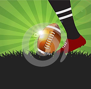 Football or rugby player with ball on grass background