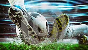 Football scene at night match with close up of a soccer shoe hitting the ball with power