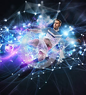 Football scene with soccer player in front of a futuristic digital background