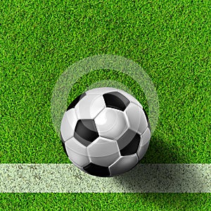 Football ( soccer ball ) in grass field.