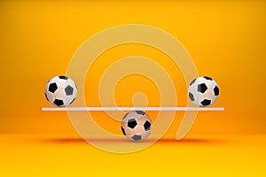 Football soccer balls balancing on a seesaw. Deuce, draw or equality on the match score or balanced equal team power photo