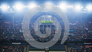 Football Soccer Championship Stadium Match, Scoreboard Screen Showing Repeat of the Goal. Crowd of