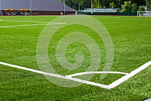 Football soccer field corner with white marks