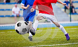 Football Soccer Kick. Boys Kicking Soccer Ball on the Pitch. Soccer football match