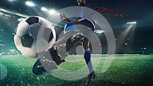 Football or soccer player in action on stadium with flashlights, kicking ball for winning goal, wide angle