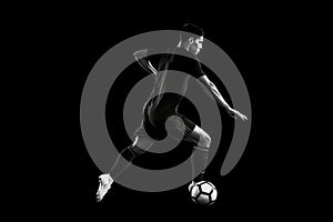 football soccer player man in action isolated black background