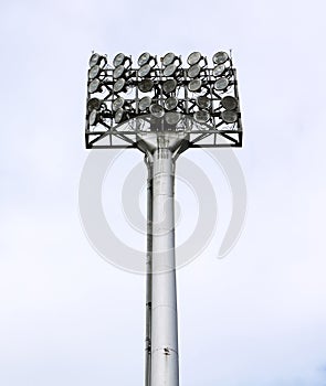 A football stadium floodlight with metal pole photo