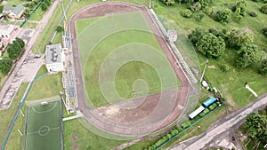 Football stadium. Green soccer field. Flying over sport arena. Sport playground