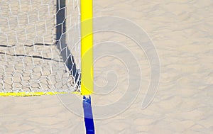Football summer sport. closeup goal net on a sandy beach outdoor .