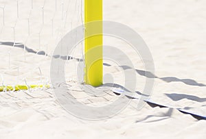 Football summer sport. closeup goal net on a sandy beach outdoor