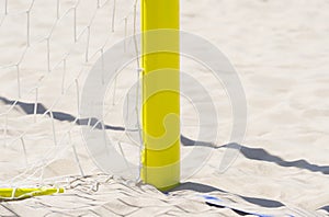 Football summer sport. closeup goal net on a sandy beach outdoor