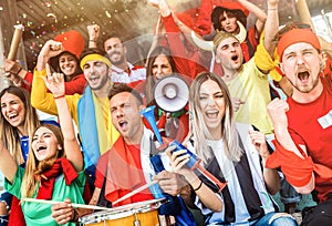 Football supporter fans friends cheering and watching soccer cup