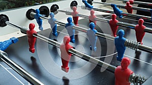 Football table or soccer table game with plastic player figurine