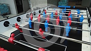 Football table or soccer table game with plastic player figurine