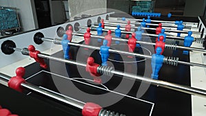 Football table or soccer table game with plastic player figurine