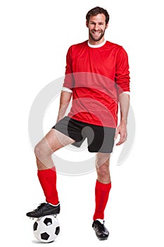 Footballer cut out on white photo