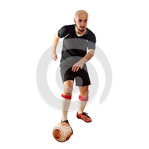 Footballer dribbles on white background