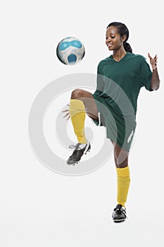 Footballer playing keepy uppy