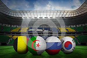 Footballs in group h colours for world cup