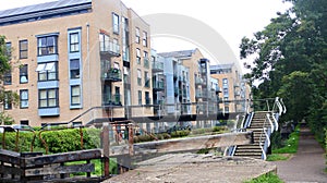 Footbridge with buildings in the background, Apsley, England