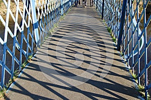 Footbridge casting shadows, Morpeth Northumberland photo
