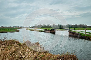 Footbridge in the Dutch polder landscape