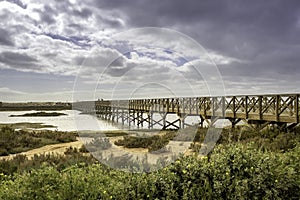 Footbridge heading to Quinta do Lago beach, in Ria Formosa. Algarve