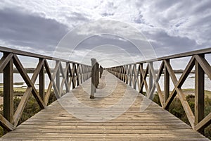 Footbridge heading to Quinta do Lago beach, in Ria Formosa. Algarve