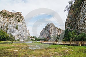 Footbridge, mountain and lake view in Khao Ngu Stone Park in Ratchaburi