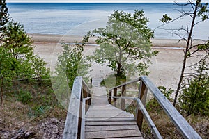 Footbridge over a dune at the beach in Latvia. Baltic Sea.