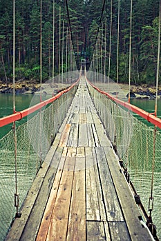 Footbridge over Katun river in Altai