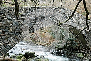 Footbridge over River Duddon at Seathwaite, Dunnerdale, Lake District, Cumbria, England, UK