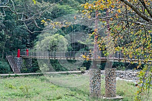 Footbridge over river in remote wilderness park