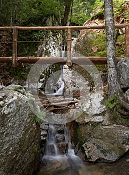 Footbridge over a small waterfall