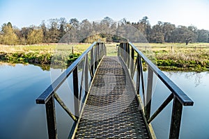 Footbridge on river Wey near Guildford Surrey England