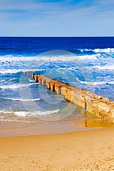 Footbridge sea sky and sandy beach