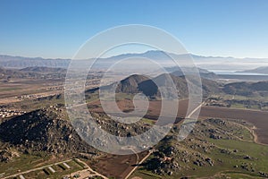 Foothills and fields aerial view from hot air balloon of housing in Murrieta southern California USA