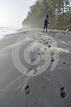 Footmarks of a man at beach