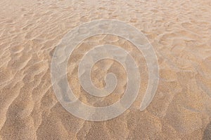 Footmarks on sand and sand texture photo