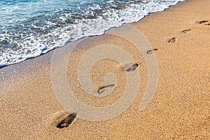 Footmarks on the sandy beach