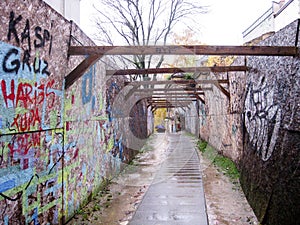 Footpath beween graffiti walls, Uzupis