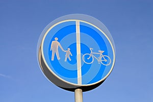Footpath left, cycle-lane right sign.
