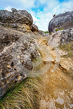 Footpath between rocks in the forest of the Enchanted City